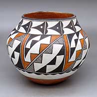 A polychrome jar decorated with a six-panel kiva step, fine line and geometric design
 by Lolita Concho of Acoma