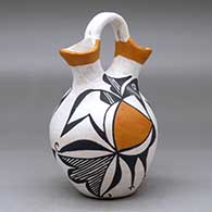 A polychrome wedding vase decorated with a two-panel bird element and geometric design, click or tap to see a larger version