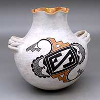 A polychrome jar with handles and a pie crust rim, decorated with an ancient two-panel geometric design
 by Stella Shutiva of Acoma