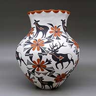 A large polychrome jar with a pie crust rim and decorated with a deer-with-heart-line and geometric design, click or tap to see a larger version