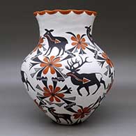 A large polychrome jar with a pie crust rim and decorated with a deer-with-heart-line and geometric design, click or tap to see a larger version