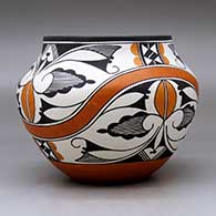 A polychrome jar decorated with a four panel rainbow and geometric design, click or tap to see a larger version