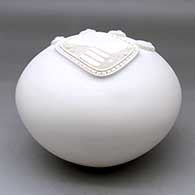 A white seed pot decorated with a sculpted bear paw applique, click or tap to see a larger version