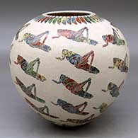 A polychrome jar decorated with a sgraffito grasshopper and geometric design
 by Leonel Lopez Sr of Mata Ortiz and Casas Grandes