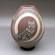 A polychrome jar decorated with a painted wildlife and geometric design
 by Manuel Rodriguez of Mata Ortiz and Casas Grandes
