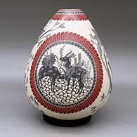 A polychrome jar decorated with a sgraffito and slipped four panel wildlife, bird, branch, leaf and geometric design, click or tap to see a larger version