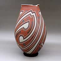 A tall polychrome jar with a geometric cut opening and a three panel lightly carved and painted geometric design, click or tap to see a larger version