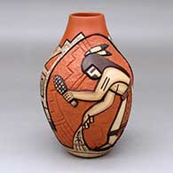 A polychrome jar decorated with a carved, sgraffito and painted corn dancer, kiva ladder, kiva step and geometric design
 by Carla Nampeyo of Hopi