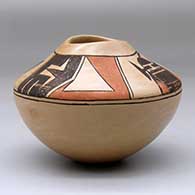 A polychrome jar with an organic opening and decorated with a kachina and geometric design above the shoulder, click or tap to see a larger version