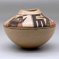 A polychrome jar with an organic opening and decorated with a kachina and geometric design above the shoulder, click or tap to see a larger version