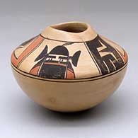A polychrome jar with an organic opening and decorated with a kachina and geometric design above the shoulder
 by Les Namingha of Hopi