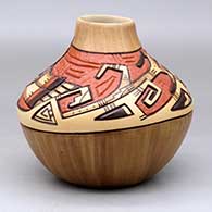A polychrome jar with a carved, sgraffito and painted Hopi Shalako Kachina, corn stalk and geometric design, click or tap to see a larger version