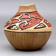 A polychrome jar with a carved, sgraffito and painted Hopi Shalako Kachina, corn stalk and geometric design, click or tap to see a larger version