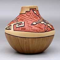 A polychrome jar with a carved, sgraffito and painted Hopi Shalako Kachina, corn stalk and geometric design, click or tap to see a larger version