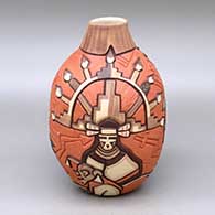 A polychrome jar decorated with a carved, sgraffito and painted Butterfly Woman, eagle dancer, mudhead and geometric design
 by Elvira Nampeyo of Hopi