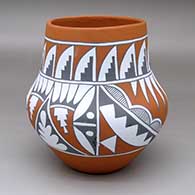 A polychrome jar with a four-panel geometric design around the shoulder and a band of feather and kiva step design around the neck
 by Mary Small of Jemez