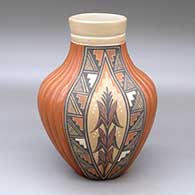 A polychrome jar with 2 panels of carved melon ribs between 2 panels of painted corn stalk and geometric design
 by Virginia Ponca Fragua of Jemez
