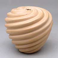 A beige spiral carved melon jar
 by Emma Yepa of Jemez