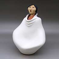 A polychrome Singing Mother wearing a manta
 by Rose Pecos-Sun Rhodes of Jemez