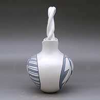 A grey on white wedding vase with a twisted bridge and decorated with a two-panel feather and geometric design, click or tap to see a larger version