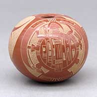 A red on red seed pot decorated with a sgraffito and painted turtle, yeibichai and geometric design
 by Dean Haungooah of Santa Clara