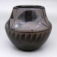 Black-on-black jar with a four-panel raincloud, feather ring, and geometric design
 by Ursulita Naranjo of Santa Clara