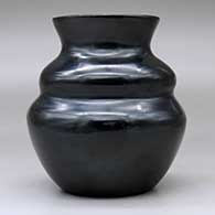 A plain, polished black double-shoulder jar with a flared rim, click or tap to see a larger version
