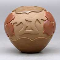 A red and buff jar carved and polished with a four panel geometric design around the shoulder, click or tap to see a larger version