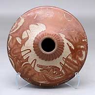 A low shouldered sienna jar decorated with a sgraffito wildlife and nature design from top to bottom
 by Paul Naranjo of Santa Clara