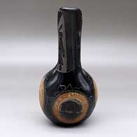 A black wedding vase with sienna spots and decorated with a sgraffito lizard, rabbit, quail, bison, dancer, kiva step and geometric design, click or tap to see a larger version