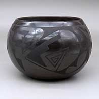 A black on black jar decorated with a geometric design around the body
 by Carlos Sunrise Dunlap of San Ildefonso