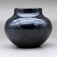 A plain, polished black jar with a short neck, click or tap to see a larger version
