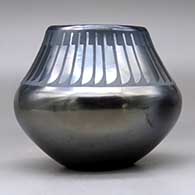 A black on gunmetal black jar decorated with a ring of feathers design above the shoulder, click or tap to see a larger version