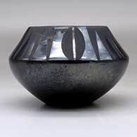A black on black bowl decorated with a four panel deer print and geometric design above the shoulder, click or tap to see a larger version
