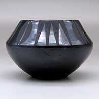 A black on black bowl decorated with a four panel deer print and geometric design above the shoulder, click or tap to see a larger version