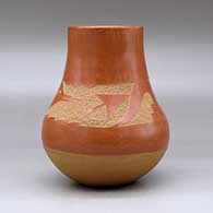 A red with a buff base, decorated with a sgraffito avanyu and geometric design plus an inlaid stone, click or tap to see a larger version