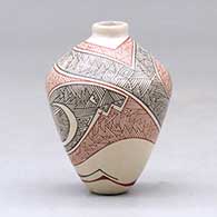 A miniature polychrome jar decorated with a fineline geometric design, click or tap to see a larger version