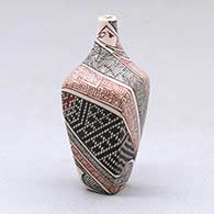 A miniature polychrome square jar decorated with a serpent, fineline and geometric design
 by Carla Martinez of Mata Ortiz and Casas Grandes