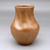 A golden micaceous jar with a tall, ribbed neck
 by Myrtle Cata of Ohkay Owingeh