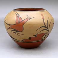 Click for a larger view A polychrome jar decorated with a four-panel roadrunner, flower, cloud and geometric design
by Eleanor Pino Griego of Zia