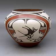 A polychrome jar decorated with a four-panel roadrunner, butterfly, rainbow, cloud formation and geometric design
 by Ruby Panana of Zia