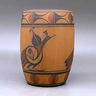 A polychrome cylinder decorated with a three-panel roadrunner, rain bird and geometric design, click or tap to see a larger version
