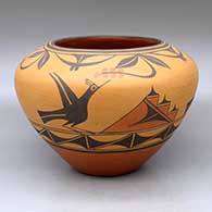 A high-shouldered polychrome jar decorated with a three-panel roadrunner, flower, cloud and geometric design
 by Eleanor Pino Griego of Zia