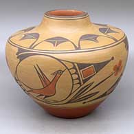 A high-shouldered polychrome jar decorated with a three-panel roadrunner, rain bird, flower, cloud and geometric design
 by Eleanor Pino Griego of Zia