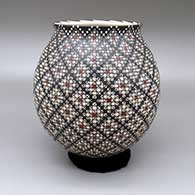 Polychrome jar with a slightly flared opening and a cuadrillos geometric design
 by Andres Loya of Mata Ortiz and Casas Grandes