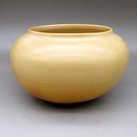 A large yellow bowl with fire clouds, and polished inside
 by Mark Tahbo of Hopi