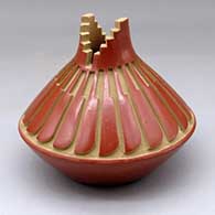 A red prayer jar carved with a kiva step cut neck and a feather design above the shoulder
 by Anna Archuleta of Santa Clara