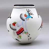 A polychrome jar decorated with an eagle dancer, deer dancer and geometric design around the body, click or tap to see a larger version