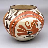 A polychrome jar decorated with a three-panel parrot, flower, rainbow and geometric design
 by Corrine Chino of Acoma