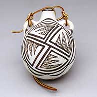 A polychrome canteen with handles and a black-on-white geometric design
 by Frances Torivio of Acoma